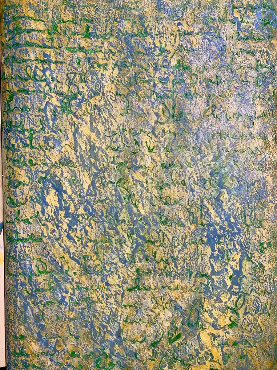 First: a layer of blue and yellow, with a journal entry carved into it.